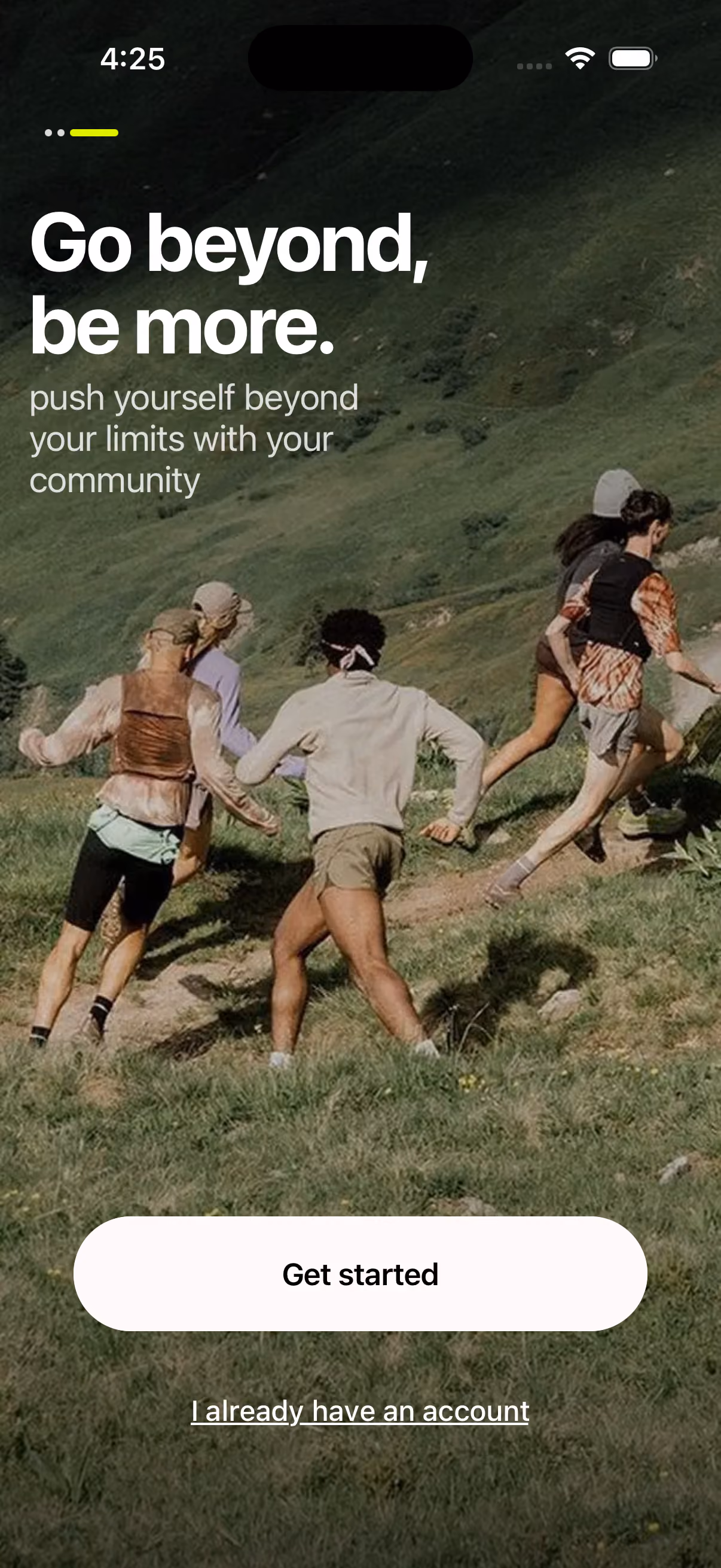 Lockd's opening screen: a full-bleed photograph of five people running up a steep grassy hillside, captioned “Go beyond, be more.”
